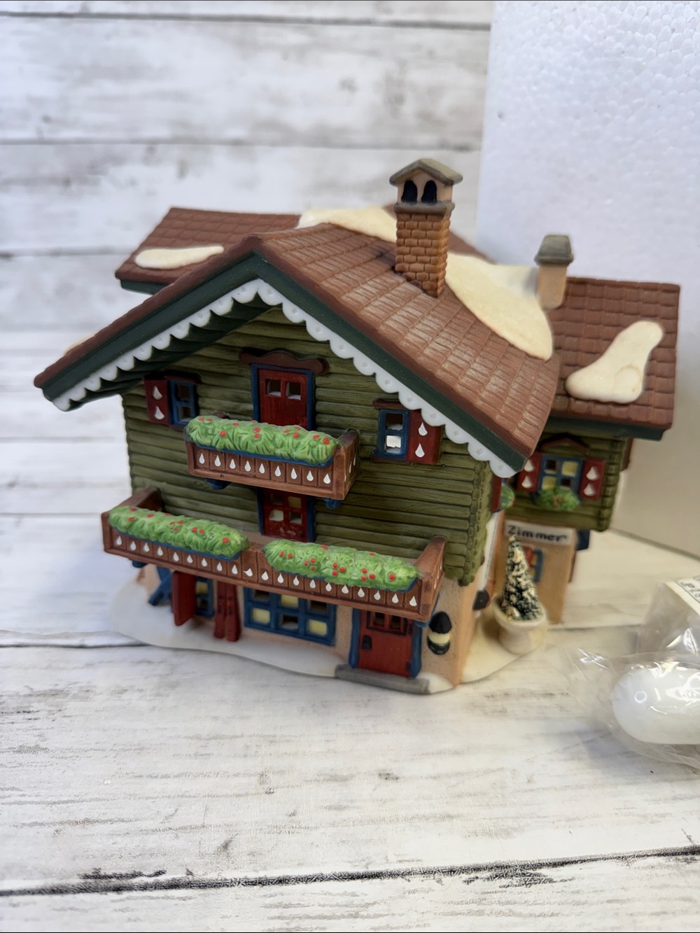 Department 56 “Sport Laden” Heritage Village Collection Alpine Village Series